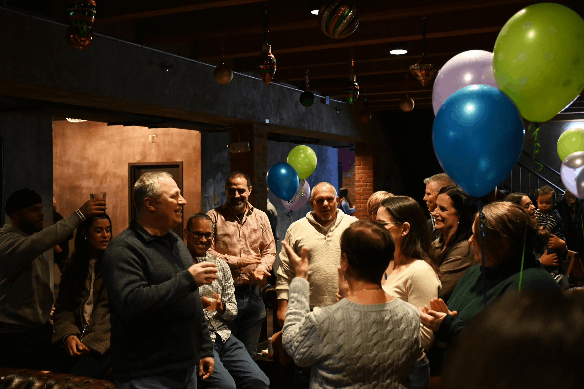 CIL CEO Kent Schwendy toasting to Maria's 30 years